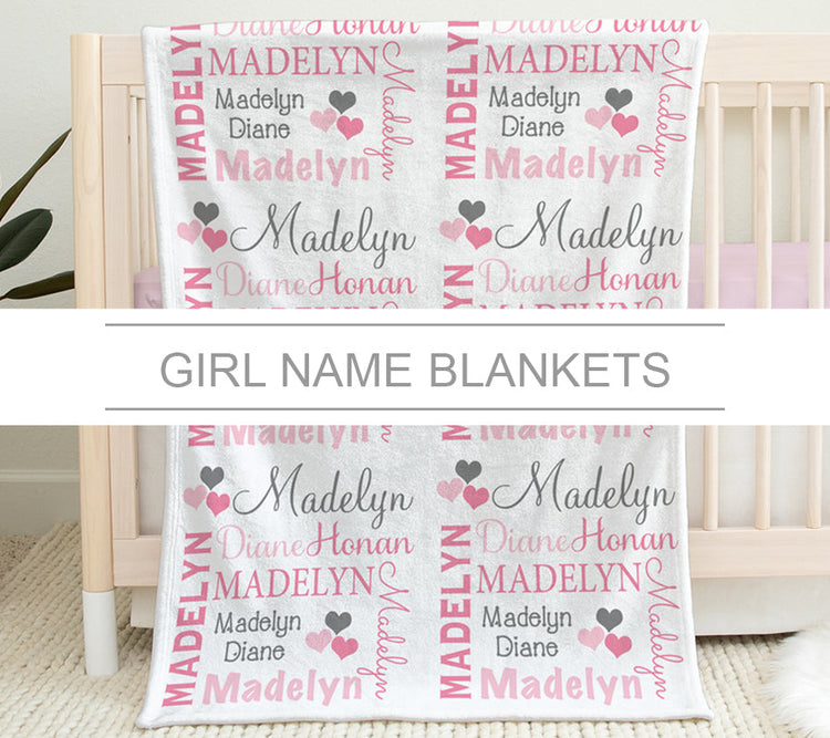 Girl Name Blankets - Baby Blanket with Pink hearts hanging on the side of a crib