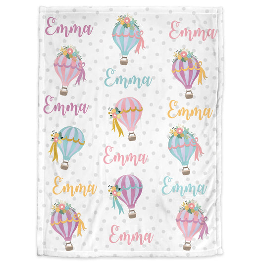 a blanket with hot air balloons on it