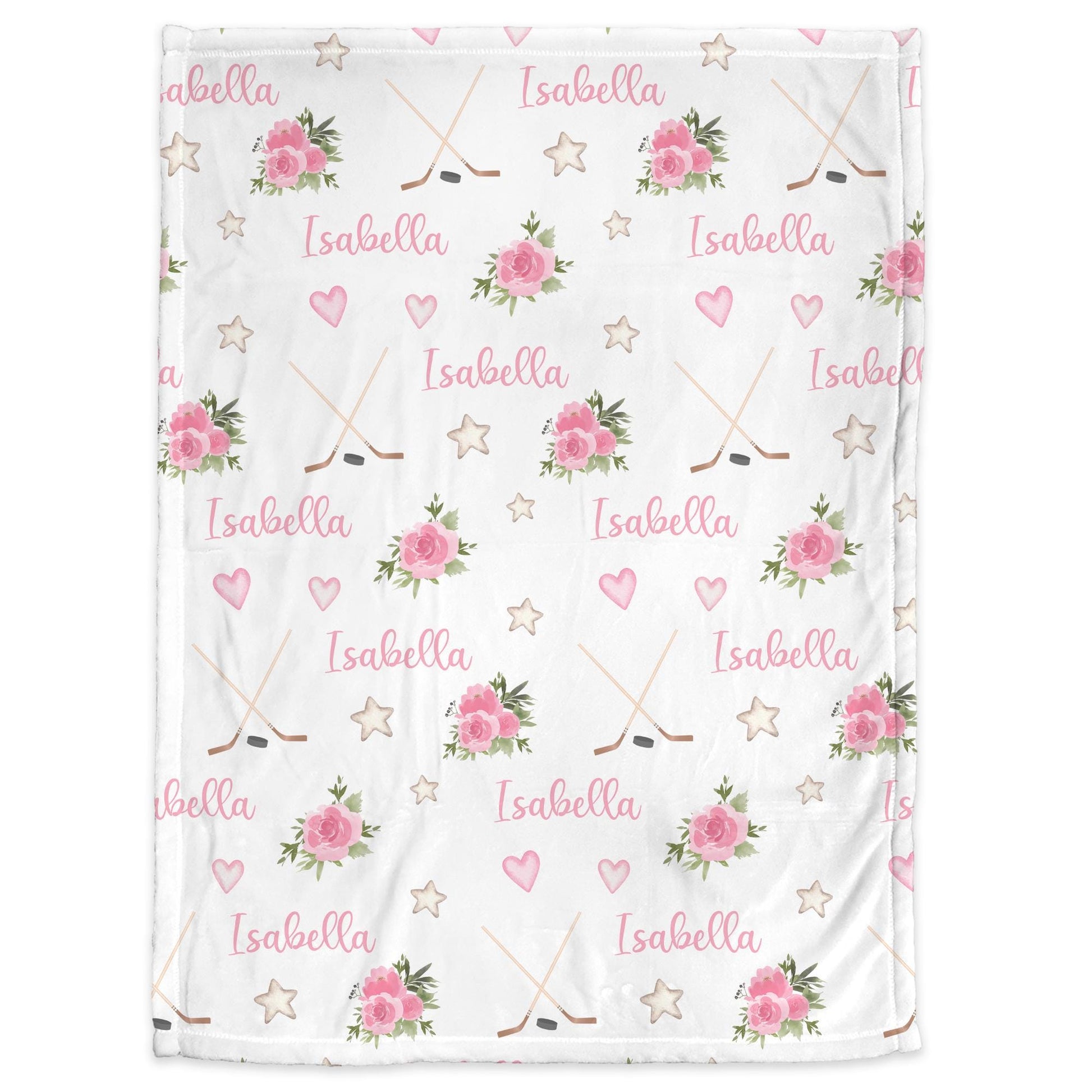 Blanket with hockey sticks, puck, and personalized with baby's name in pink pictured on a white background.