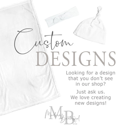 a white towel and a white hat with the words custom designs looking for a design